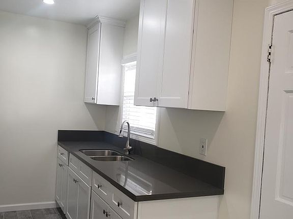 Kitchen door opens to kitchen