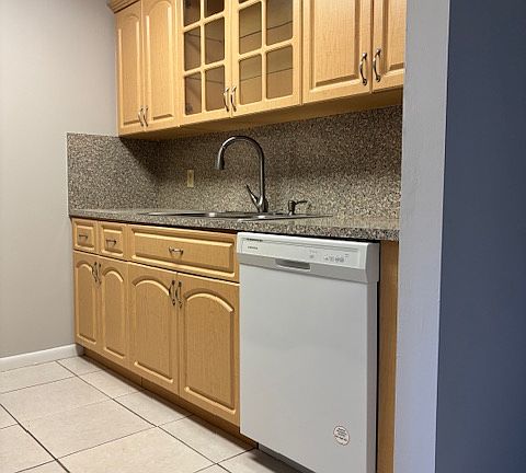 Kitchen (rt side) includes dish washer.