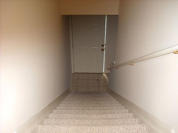 Stairs leading to front door.