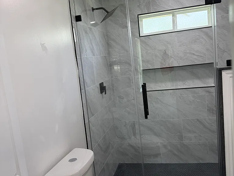 master bath, natural light, dual sinks, modern fixtures, shower bench