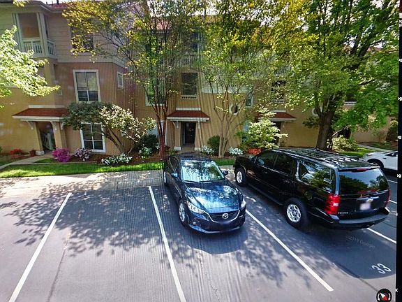 Front view......Beautiful landscaping, always maintained. Assigned front row parking space comes with condo!