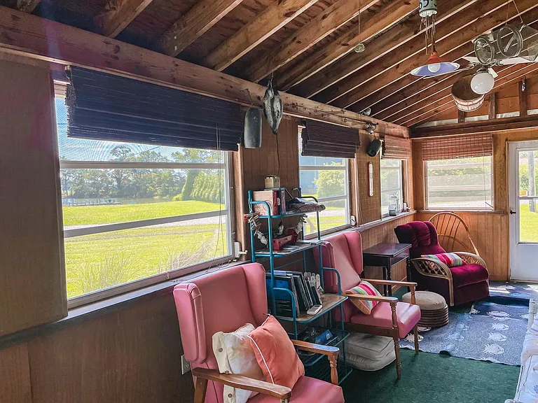 sunroom with waterview and community property water access