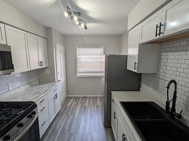3355 Warren Rd — Photo 4