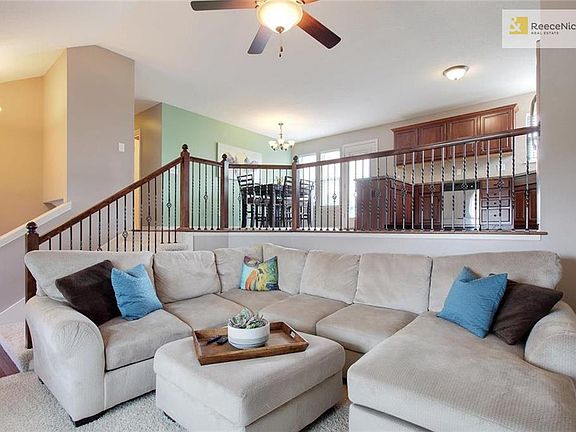 This home is filled with natural light.  Vaulted ceilings and an open floor plan make it perfect for entertaining.