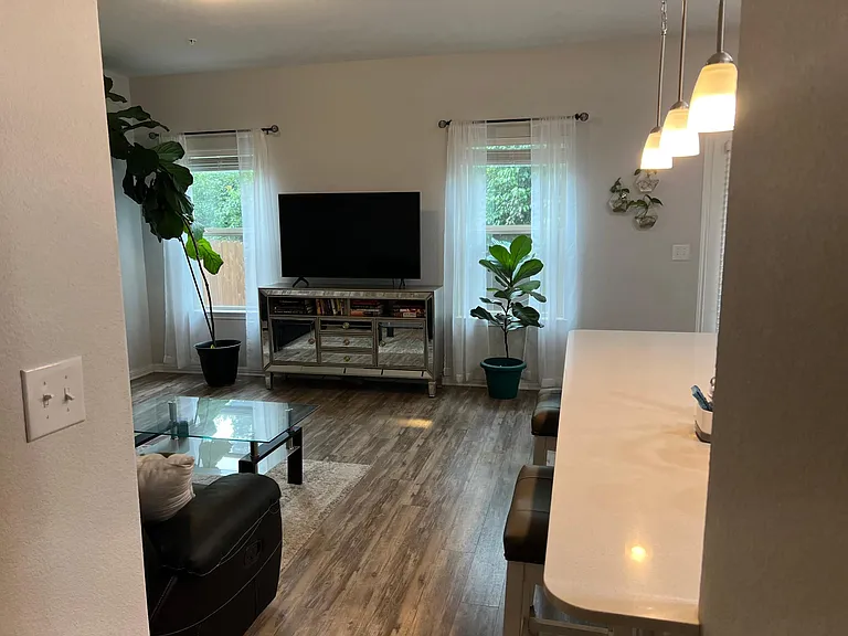 Large windows in the living room on main floor