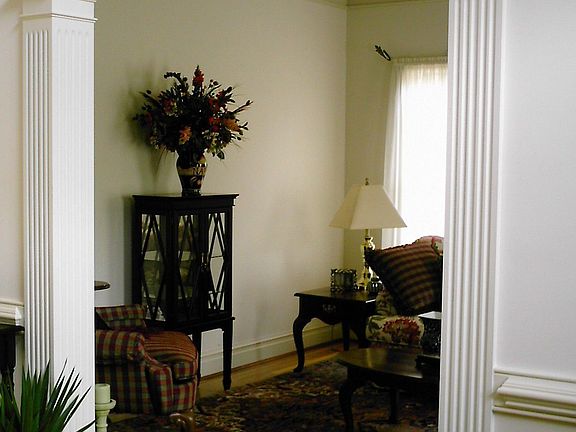 Formal Living RM.  Hardwood, extensive dentil moulding 