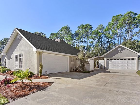 2 car garage PLUS 2 car detached garage