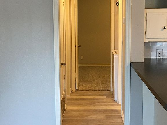 Hallway to bathroom and bedrooms