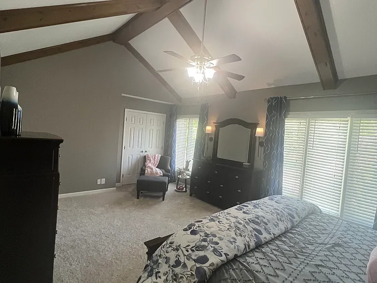 Primary bedroom with sitting area