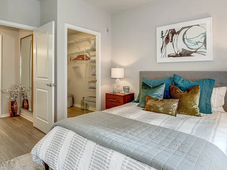 Bedroom with Hardwood Flooring and Walk-in Closet