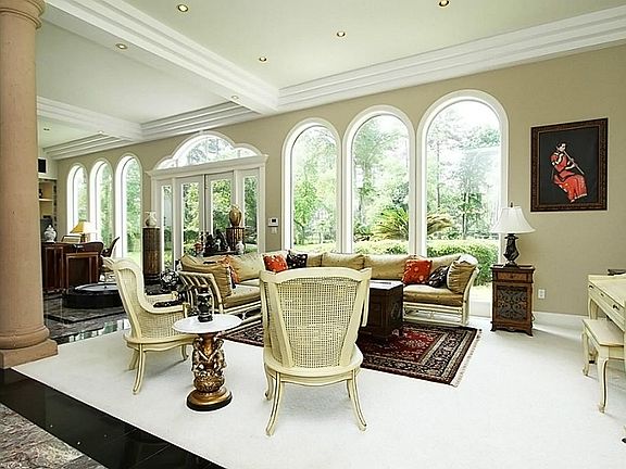 Majestic open great room provides maximum versatility in its open layout & design. This area can accommodate oversized furniture settings & provides an excellent open flow & breathtaking views. Perfect for entertaining!