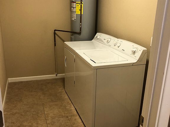 Laundry room with access to garage