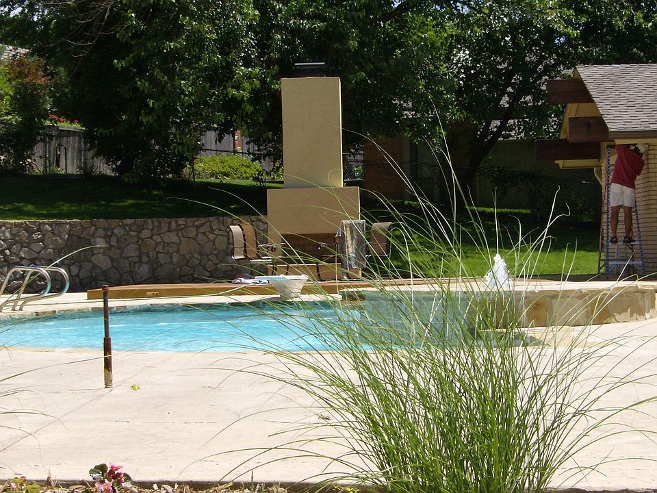 remodeled pool and outdoor living area