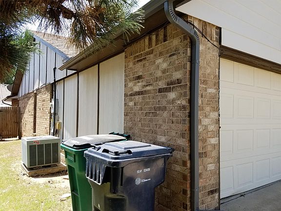East side of the house showing backyard access.