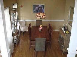 Formal Dining Room features hardwoods and columns!