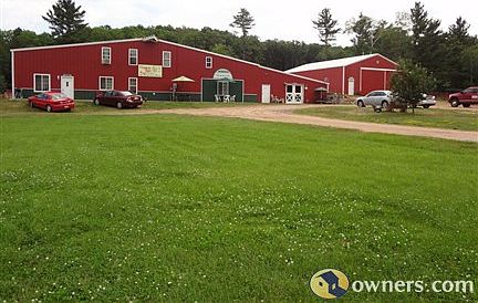 BEAUTIFUL NORTHWOODS PREMIERE TURN-KEY HORSE FACILITY