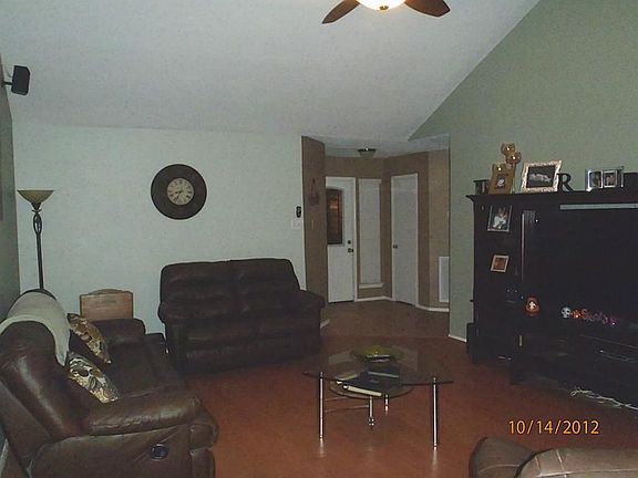 High ceiling and beautiful flooring in living area!