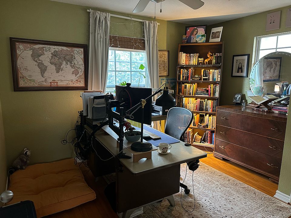 Back bedroom. Here used as an office or study. FYI the closets are not large.