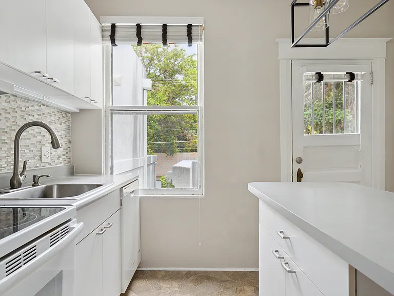 Kitchen exits onto private balcony
