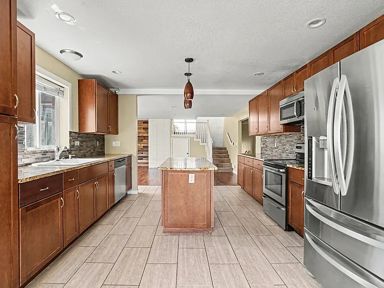 5045 Eliot St — Photo 3