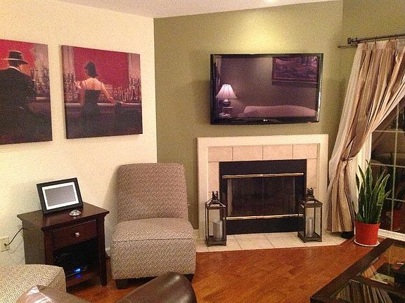 Wall Mounted TV (50 Inch) Included!