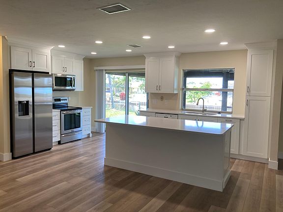 Open kitchen with canal view.