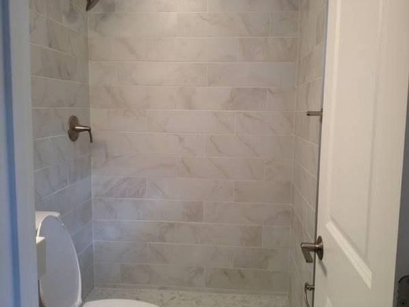 Large tiled shower in the bathroom