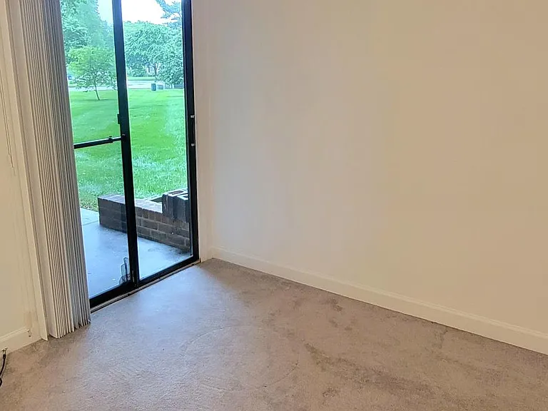 Master bedroom with walk out to patio.