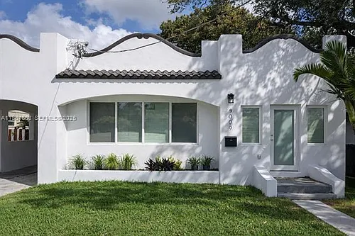 3079 NW Flagler Ter Photo 1