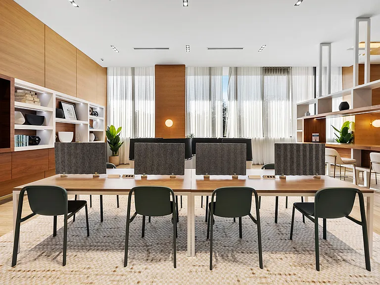 Dedicated coworking areas provide stylish workspaces for productivity close to home.