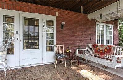 Large covered front porch, original craftsmanship & porch swing!