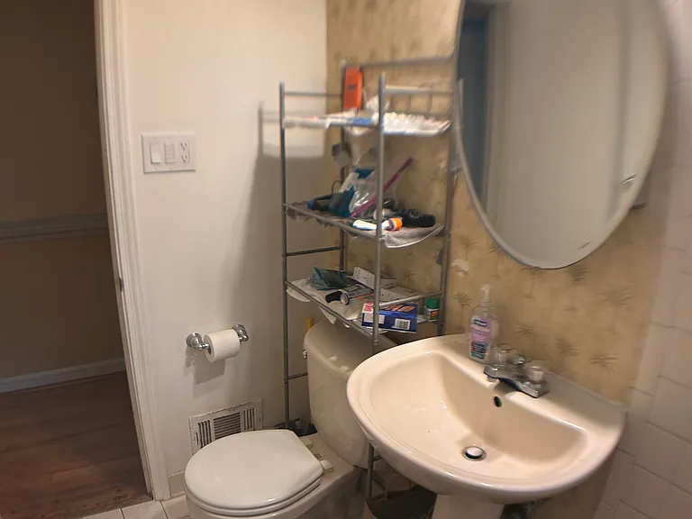 Upstairs full bath with tub.