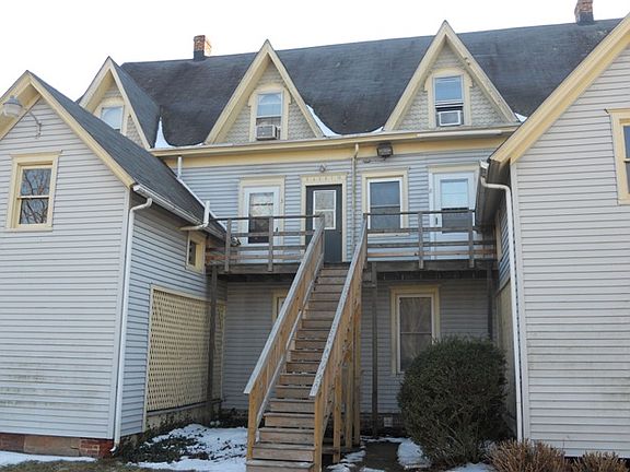 Apt on right top of steps