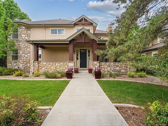 Front Exterior with beautiful trees, perennials and gardens!