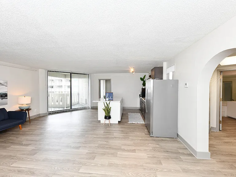 Spacious living room with hardwood-style flooring