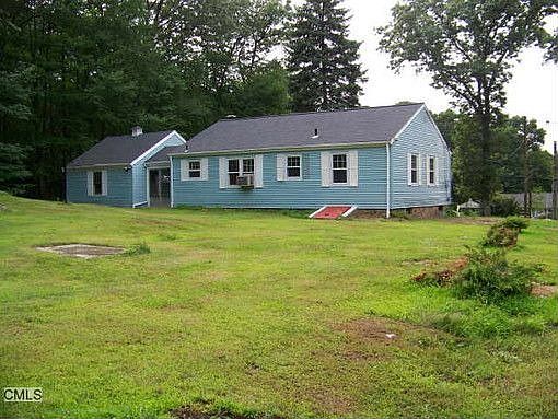 Rear of house-lawn & woods