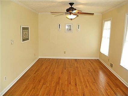 Spacious dining room with hardwood floors...