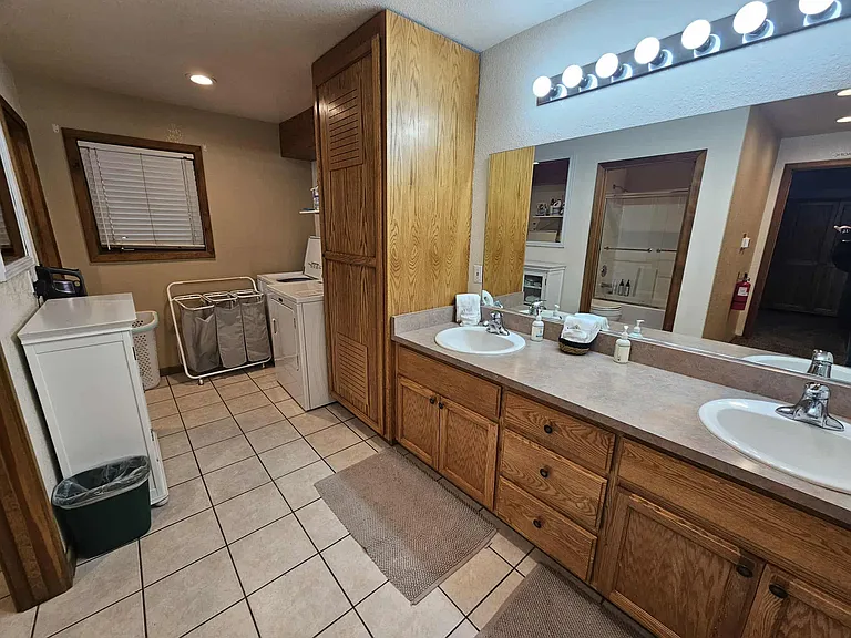 Downstairs bathrooms sink areas and laundry