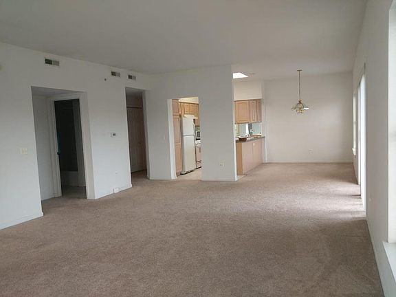 View of Living Room, Dining Room, and Kitchen