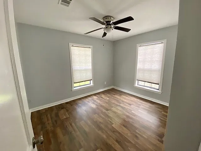 1st bedroom w/ sliding door closets.