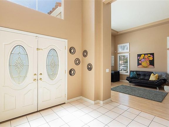 Entryway through beautiful double doors