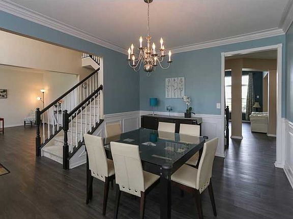 Dining Room. Crown moldings & Engineering laminated floors.
