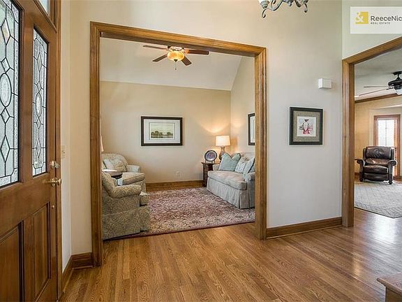 Formal living room could be easily converted into a private office off the main entrance.  The vaulted ceilings in this room make it feel spacious.