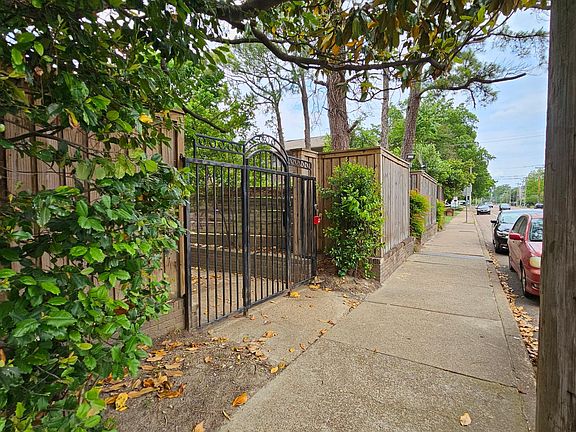 Gated entry into courtyard and front of the building
