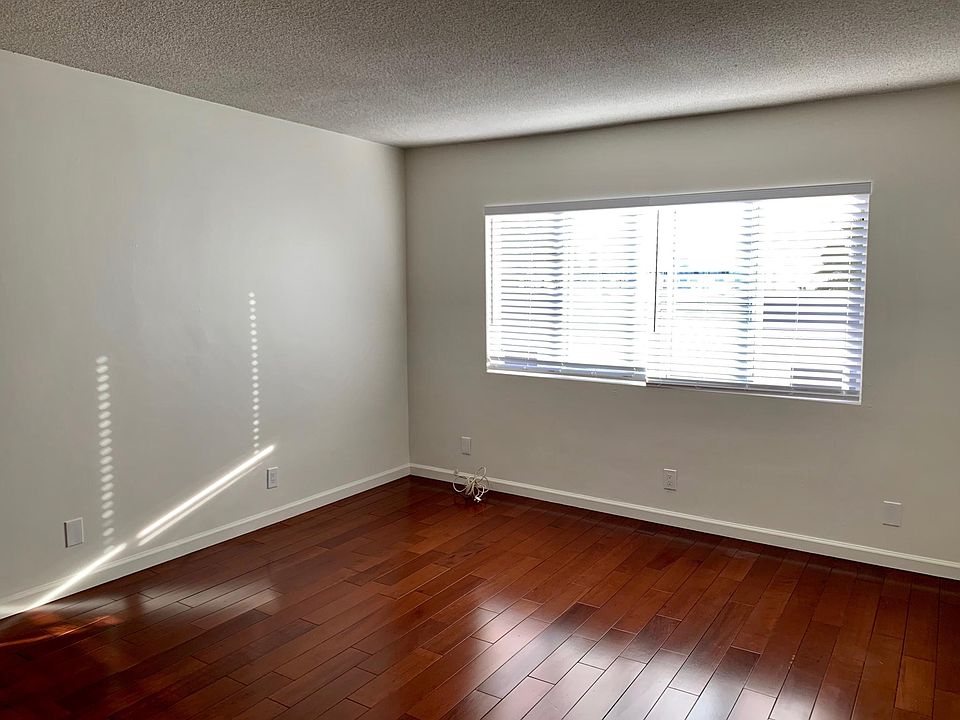 Living room with rooftop view of downtown