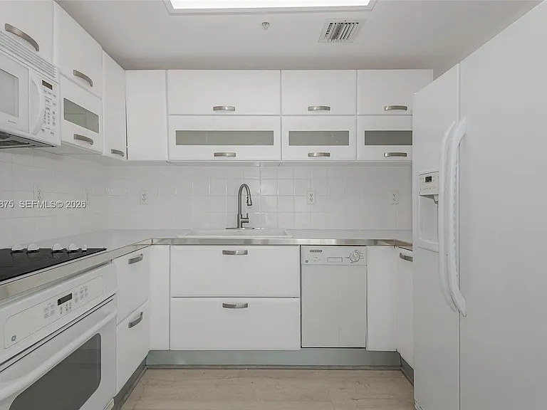6580 Indian Creek Dr #310 — Photo 2