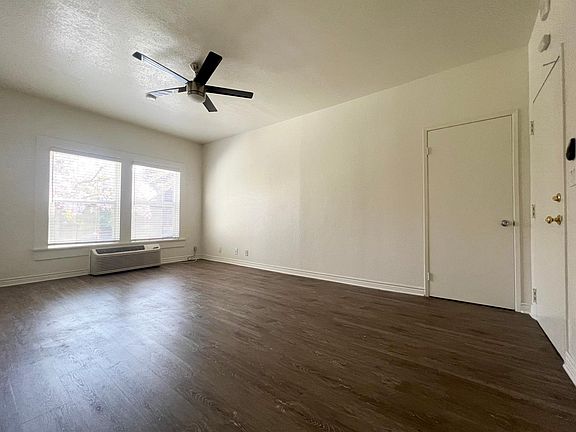 High ceilings with ac/heater unit and ceiling fan included.