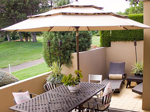 Walled off patio for privacy and private entry to primary bedroom
