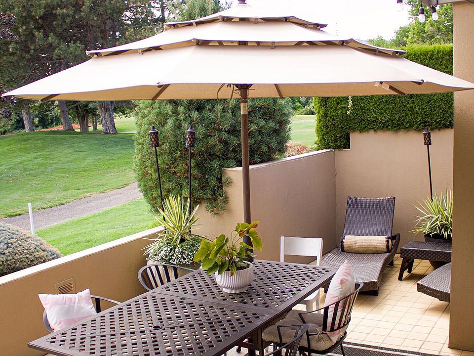 Walled off patio for privacy and private entry to primary bedroom