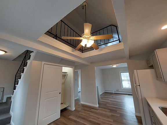 Kitchen looking into Living Room and Loft above.